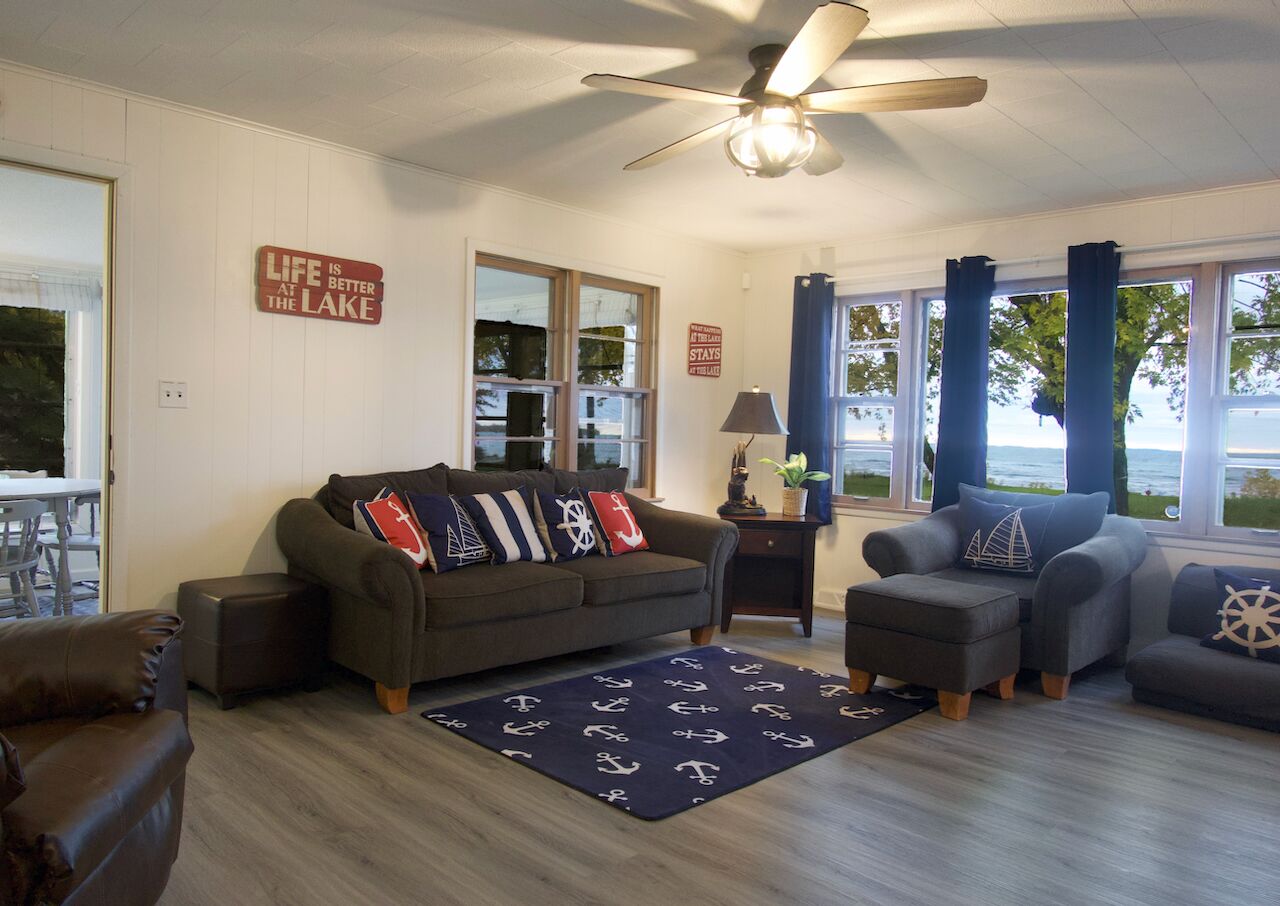 Smart TV, fireplace, books, computer monitors