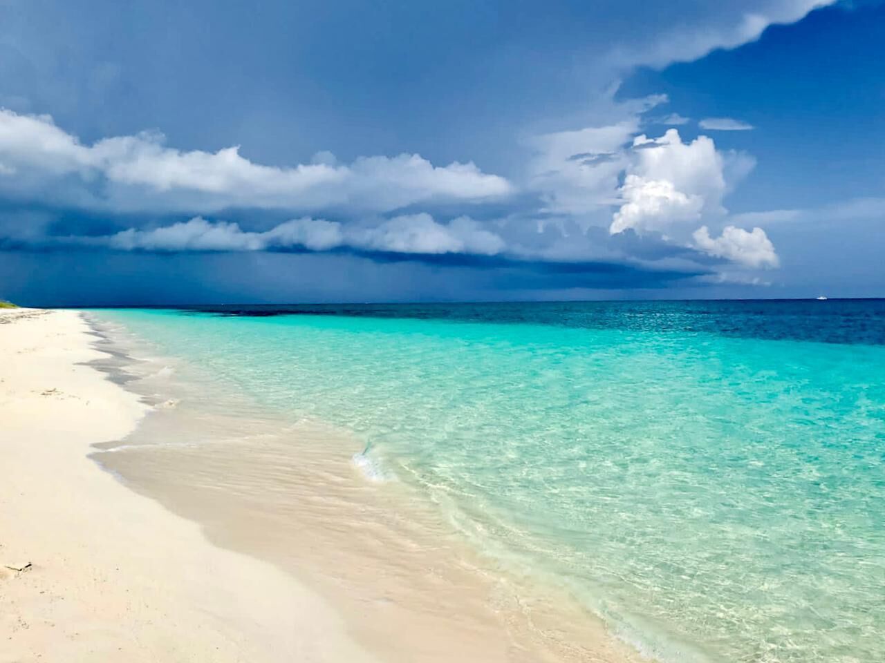 On the beach, sun loungers, beach towels