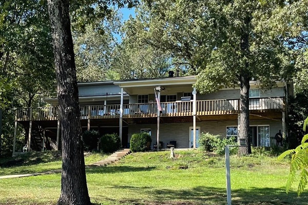 King's Port on Lake Hamilton, Main deck above, patio with hot tub below.