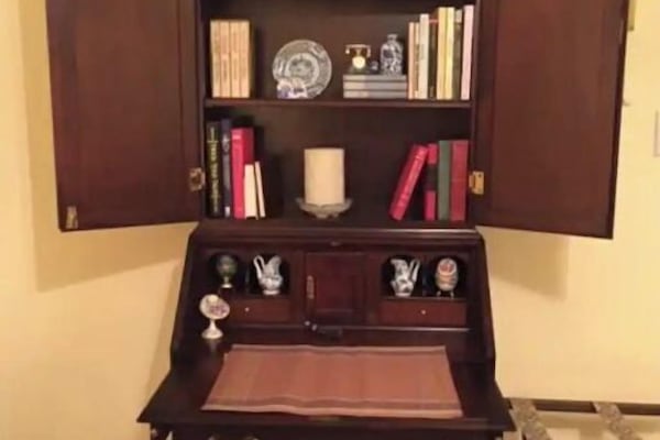 The Secretary provides space for your laptop.