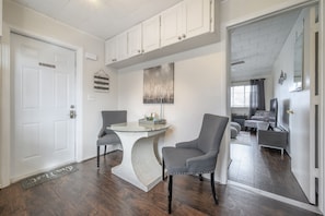 Relax in a clean and welcoming space with a comfortable seating area and a cozy sofa.