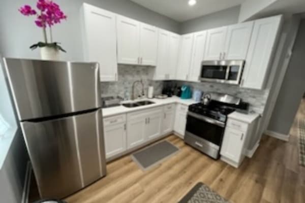 Deluxe Duplex (Second Floor) | Private kitchen | Oven, cookware/dishes/utensils, freezer