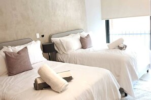 2 slaapkamers, een strijkplank/strijkijzer, gratis wifi, beddengoed