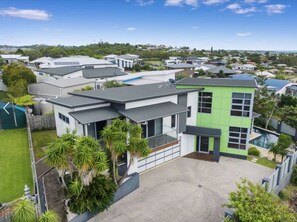 `An impressive multi-level home with private pool, double garage, and ocean glimpses on the horizon — your Hervey Bay holiday headquarters. - Sandy View - 180 degree views - Luxury Home (Nikenbah)