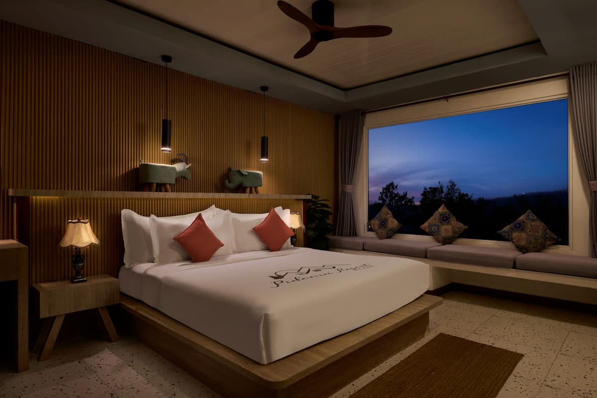 Minibar, desk, blackout drapes, iron/ironing board