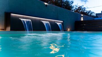 Outdoor pool, open 10:30 AM to 7:30 PM, pool umbrellas, pool loungers