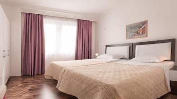 Deluxe Apartment | Premium bedding, in-room safe, desk, soundproofing