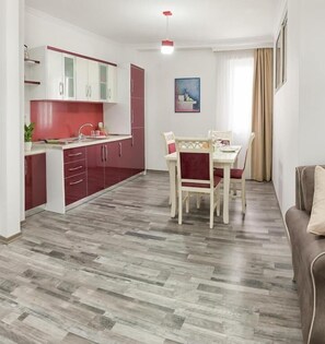 Deluxe Apartment | Private kitchen | Fridge, oven, cookware/dishes/utensils, paper towels - Dora Residence (Tirana)