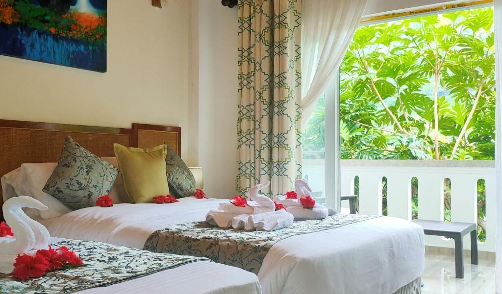 Premium bedding, memory foam beds, minibar, in-room safe