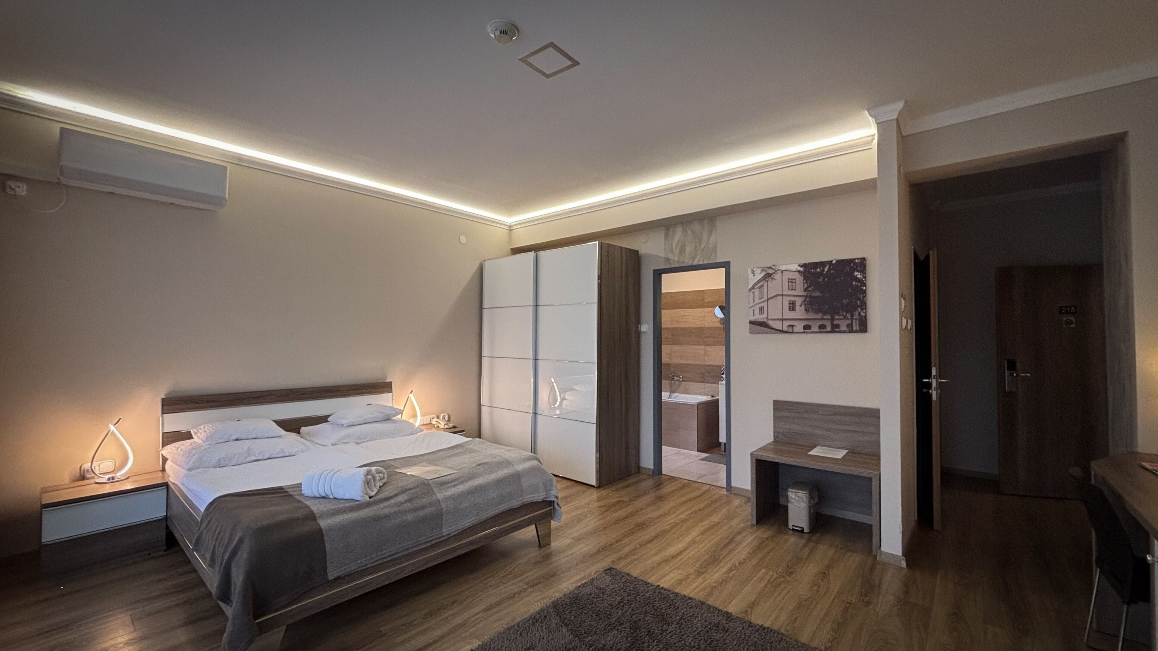 Premium room first floor | Minibar, in-room safe, desk, iron/ironing board
