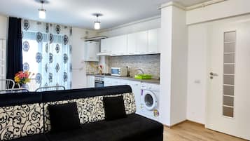 Family Apartment | Living area | 140-cm Smart TV with cable channels, TV
