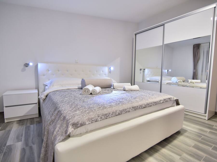 Luxury Condo | Hypo-allergenic bedding, in-room safe, individually decorated