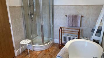 Bathtub, hair dryer, towels, soap