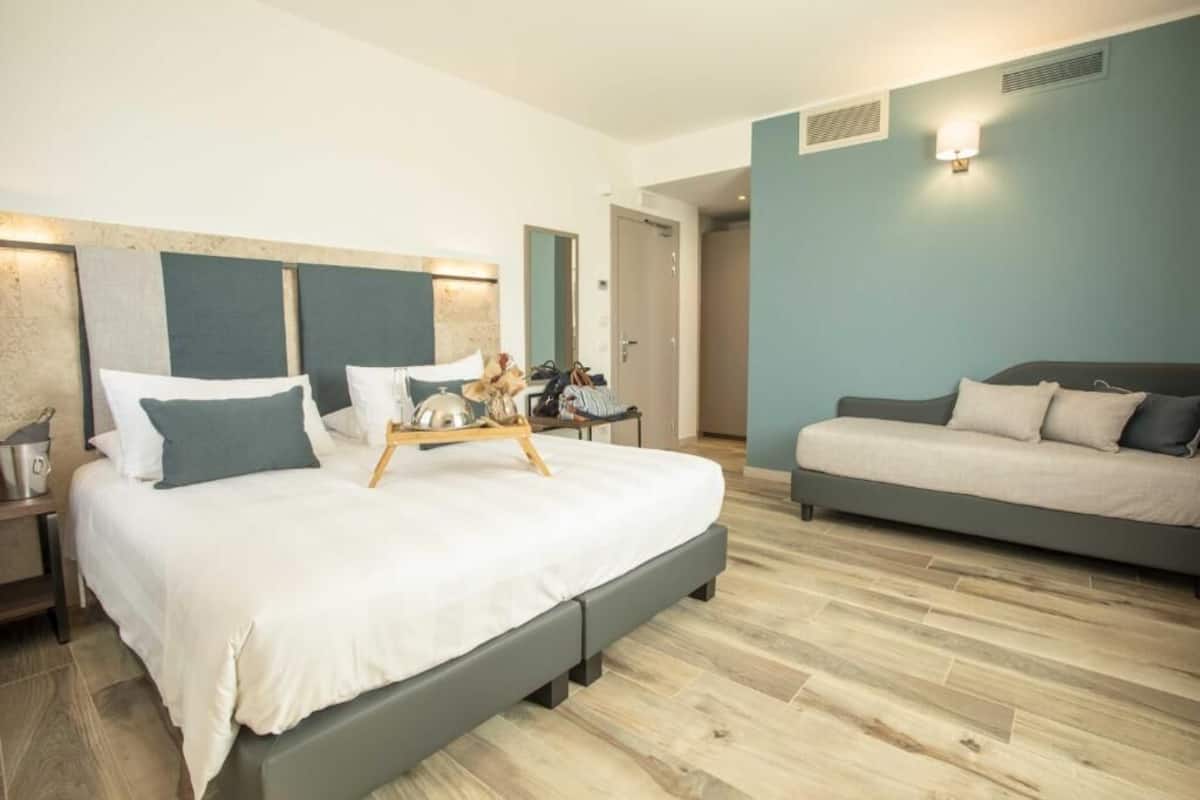 Premium bedding, down comforters, desk, laptop workspace