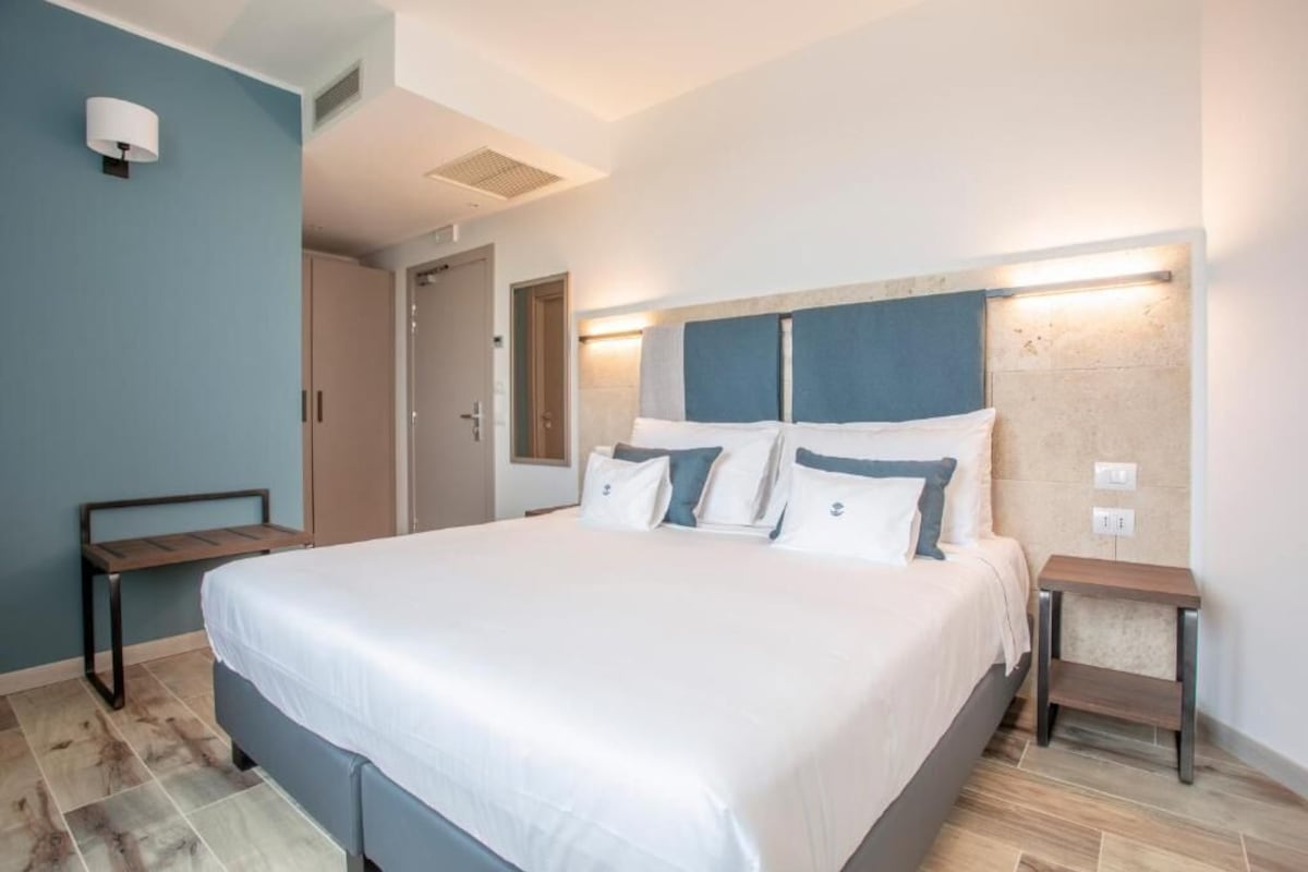 Premium bedding, down comforters, desk, laptop workspace