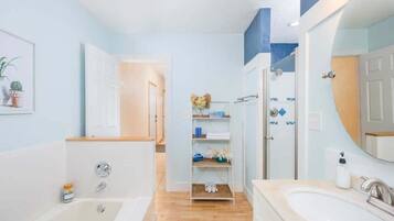 Bathtub, hair dryer, towels