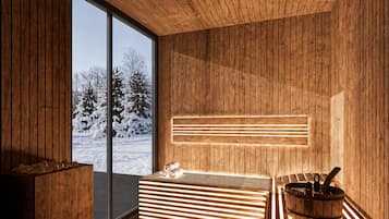 Interior de madera con un ventanal grande, un banco de sauna y una bañera de sauna.