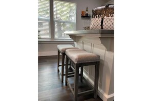 Enjoy cooking in this well-equipped kitchen with a window offering a view.