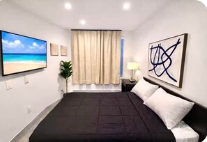 1 dormitorio, tabla de planchar con plancha, wifi gratis y ropa de cama