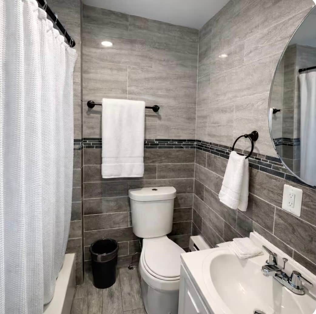 Combined shower/tub, hair dryer