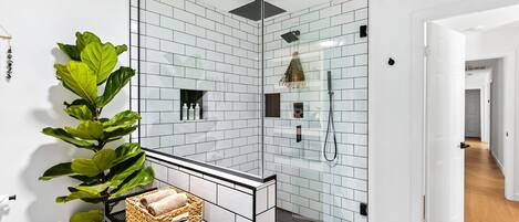 Combined shower/tub, hair dryer, towels, soap