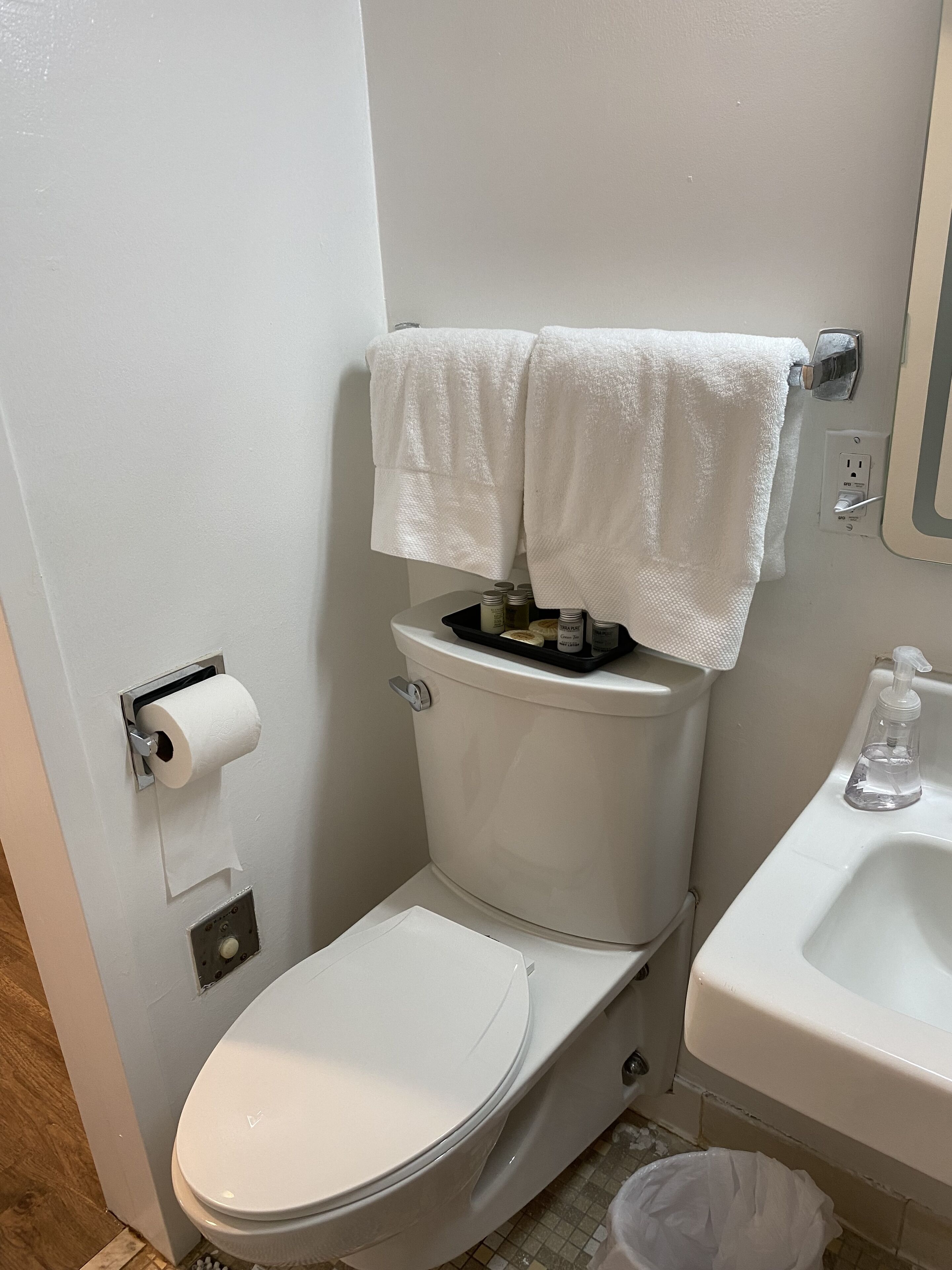 Combined shower/tub, towels, soap, shampoo