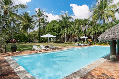 Walk to the beach from Tropical luxury Villa.