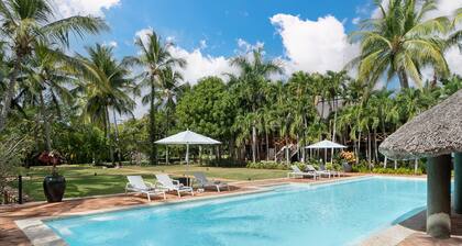 Walk to the beach from Tropical luxury Villa.