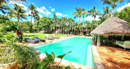 Walk to the beach from Tropical luxury Villa.