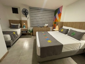 Superior Triple Room | Hypo-allergenic bedding, individually decorated, laptop workspace - Hotel Medallo City (Medellín)