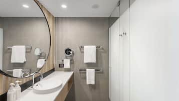 Designer toiletries, hair dryer, towels, soap