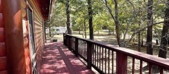 2 story log cabin with lake view. Located in front of Raymond Gary state park.