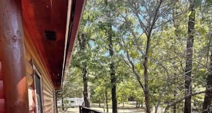 2 story log cabin with lake view. Located in front of Raymond Gary state park.