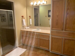 Combined shower/bathtub, hair dryer, towels, soap