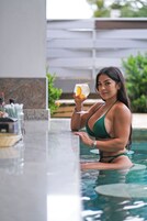 Outdoor pool, open 7:00 AM to 10:00 PM, sun loungers