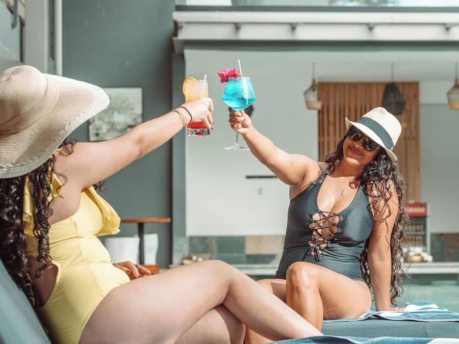 Outdoor pool, open 7:00 AM to 10:00 PM, pool loungers