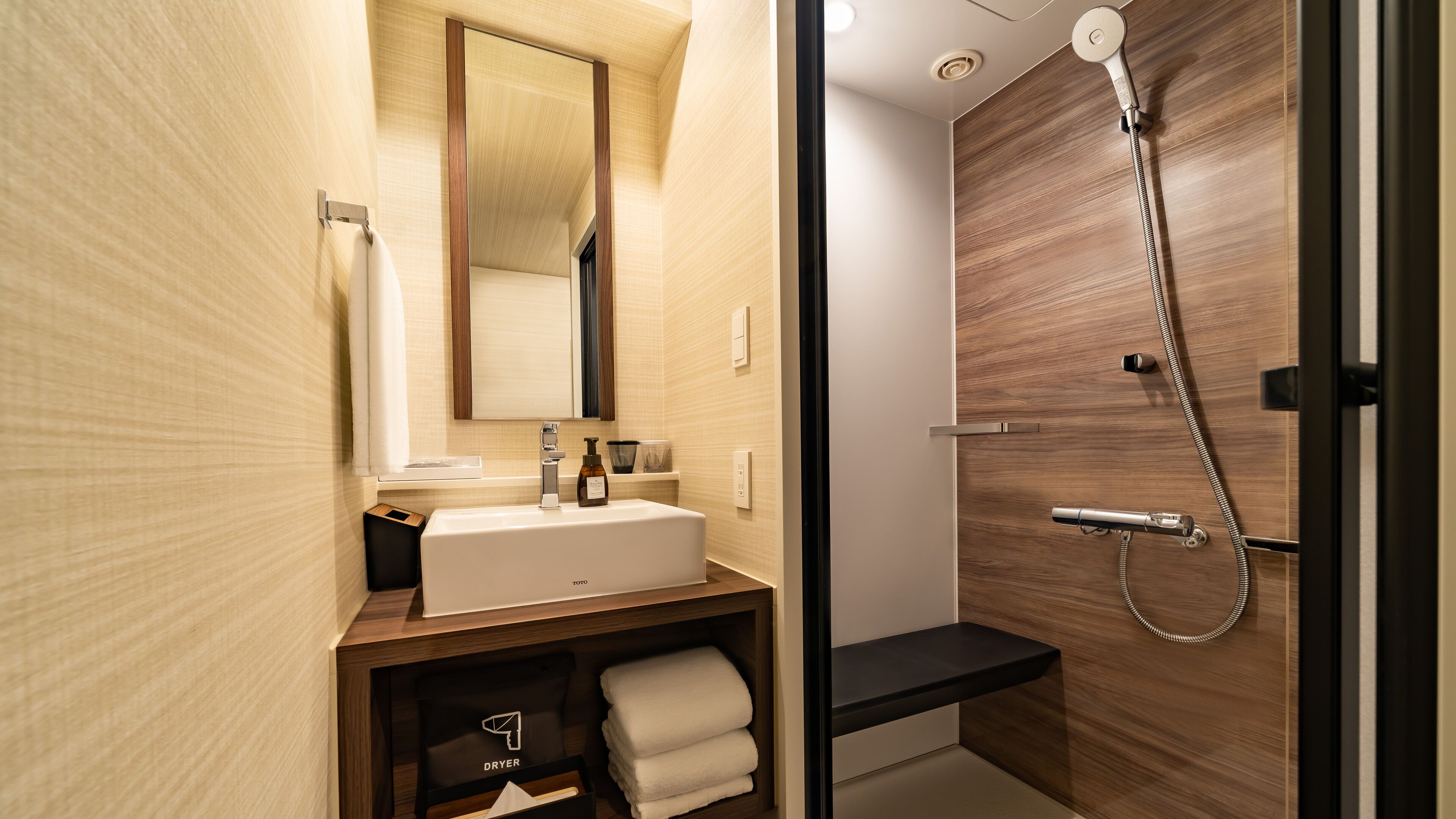 Shower, free toiletries, hair dryer, slippers