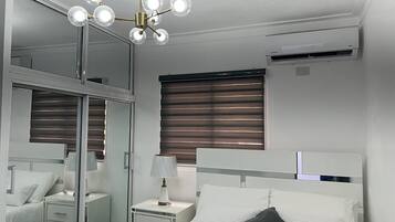 2 dormitorios, tabla de planchar con plancha, wifi gratis y ropa de cama