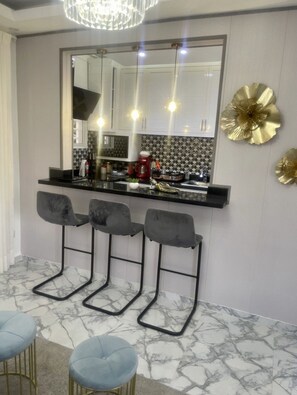 Microwave, oven, coffee/tea maker, cookware/dishes/utensils