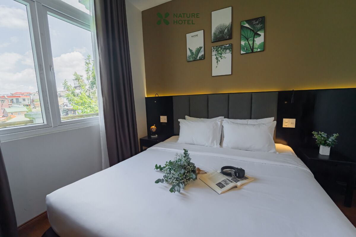 Deluxe Double or Twin Room | Down comforters, minibar, in-room safe, individually decorated