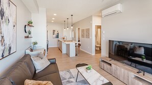Living area - Condo w/AC & UG Parking, 15 mins to YYC (Calgary)