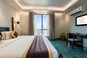 Kamar Double Premium | Selimut bulu angsa, minibar, meja kerja, dan Wi-Fi gratis