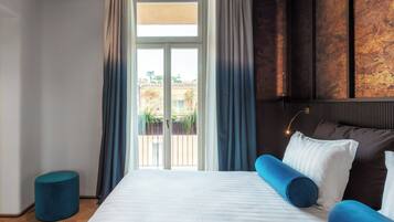 Suite, Garden View | 1 bedroom, hypo-allergenic bedding, down comforters, minibar