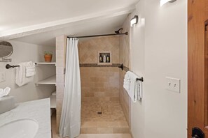 Bathtub, hair dryer, towels