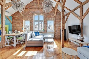 Premium Apartment, 1 Bedroom, Mezzanine | Living room | 42-inch flat-screen TV with cable channels, TV - Sopot Cosy ATTIC (Sopot)