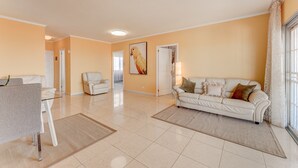 A spacious living room with a sofa, armchairs, and a dining area. - Vacation Villa 'Ocean View 3bedroom  with Pool' with Sea View, Wi-Fi and Air Conditioning (Callao Salvaje)