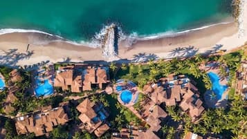 6 outdoor pools, open 8:00 AM to 9:00 PM, pool loungers