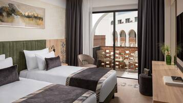 Ropa de cama de alta calidad y minibar con artículos gratuitos