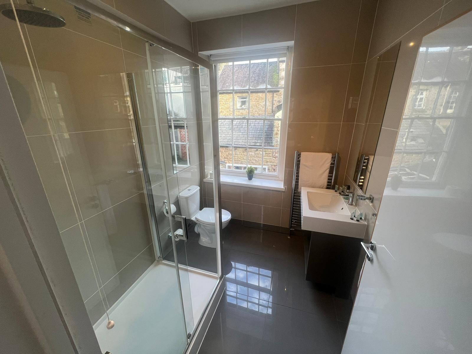 Family Studio | Bathroom | Shower, rainfall showerhead, free toiletries, hair dryer