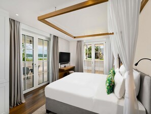 Suite Deluxe, varias camas | Ropa de cama hipoalergénica y minibar 